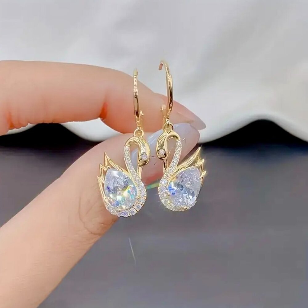 Dazzling Gold Swan Drop Earrings